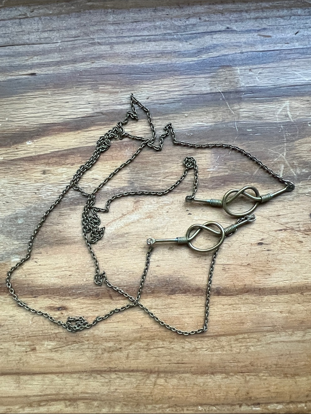 Erica Weiner Brass Pretzel Knot Necklace